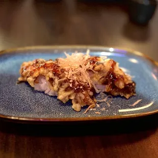 a piece of food on a blue plate