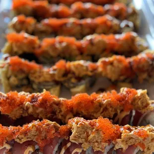 a variety of sushi rolls