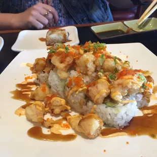 The omg roll is impressive and quite good. That brown sauce was a bit offsetting though and was on our other rolls as well.