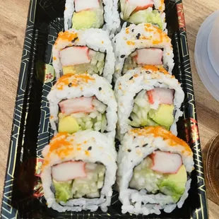 a close up of a plate of sushi