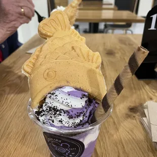 Vanilla &amp; ube swirl "upside down" with Oreo dust and strawberry.