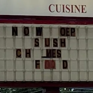 Is this Wheel of Crackhead Fortune? Fix this gibberish sign, Hanami!