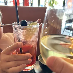 Shirley temple with dark cherries and some Chardonnay