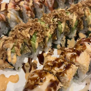 a plate of sushi rolls
