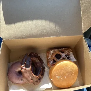 Blueberry Cake Donut, Chocolate Old Fashioned, Glazed Strawberry Filled, Blueberry Lace