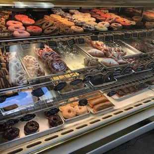 a display case full of donuts