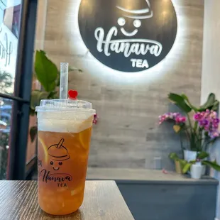 Mango lemon peach fruit tea with mango popping boba