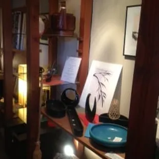 Japanese prints and ikebana containers in one of the diplay rooms inside Hanayagi-The Japanese Garden Shop.