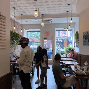 a group of people in a restaurant