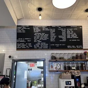 a menu on the wall of a restaurant