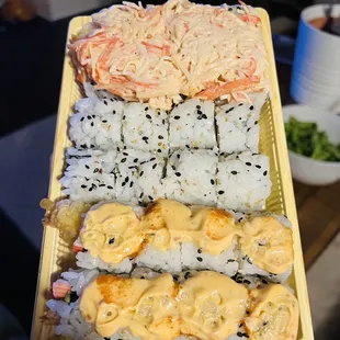 Volcano Roll $13, Philadelphia Roll $9, Mexican Roll $13 (top to bottom).