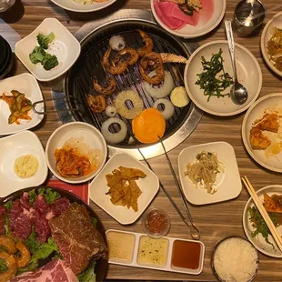 Our whole table was FILLED with meats, seafood, veggies, banchan, stew, cheese corn, and more!