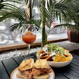 Daily happy hour from 4-7 pm! Got frose, Chicken and Biscuit Sliders and Handcraft Nachos