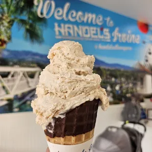 Horchata ice cream in a chocolate dipped cone, huge portion sizes even for a small cone!