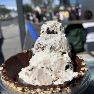 Oreo with Cheescake in a chocolate dipped waffle with peanuts