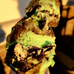 Single mint oreo on a sugar cone