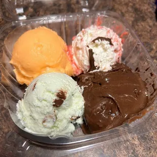 Sampler. Orange sherbet, Strawberry Cheesecake Chunk, Pistachio, Chocolate Cake Batter