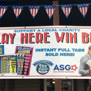 a sign for play here win big