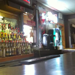 a bar with a lot of bottles