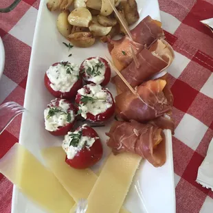 Pecorino Romano cheese, pepperoncini with blue cheese, prosciutto &amp; melon &amp; garlic