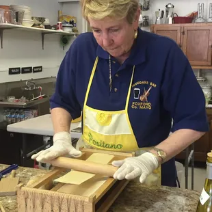 Yvonne making pasta on one of her machines.