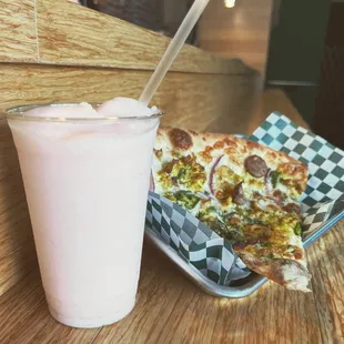 a slice of pizza and a drink