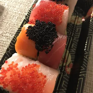 a variety of sushi with cavia