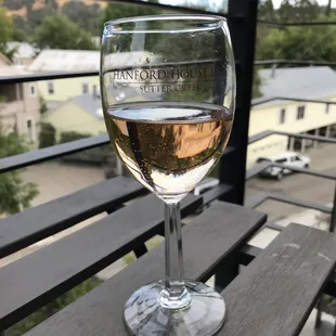 Glass of wine on the balcony.