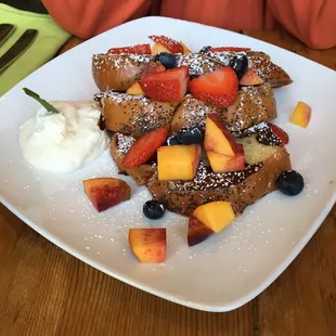 Challah bread french toast. Make sure you ask for extra whipped cream!