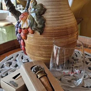 a pitcher and wine glasses