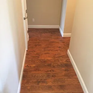 Looks great! TruCraft Hickory Bourbon Hand scraped Laminate Flooring