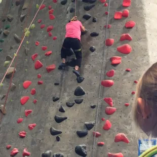 Watching mommy climb for the first time.