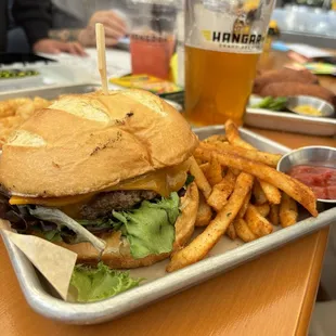 Heritage Burger with Cajun fries  - Peach onion jam is so good! Next time I&apos;m ordering extra.