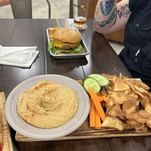 Hummus and pita chips, appetizer significant portion! Also incredible burger (pricey)