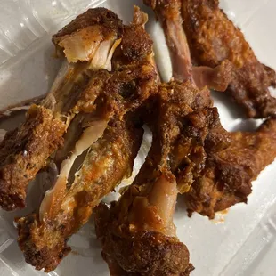 Chicken wings that have been refried.  They have the taste and texture of hard plastic!