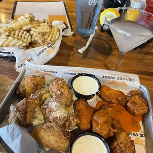 Garlic Parmesan and buffalo wings with waffle fries and lemon drop