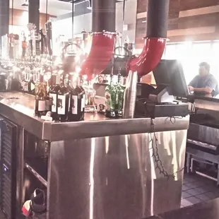 a view of the kitchen area of a restaurant