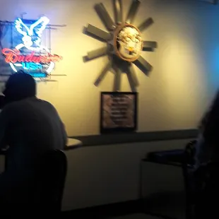 two people sitting at a bar