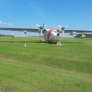 the tail end of an airplane on the runway