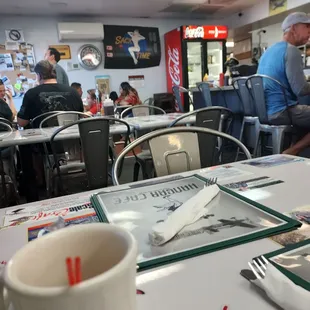 diners sitting at tables in a restaurant