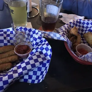 Mozzarella sticks w/ marinara sauce, egg rolls with sweet chili sauce