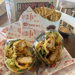 Chicken Sandwich in a wrap and waffle fries.