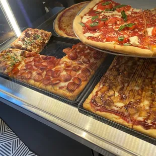 a variety of pizzas