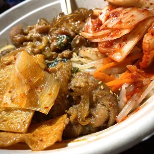 Chicken rice bowl extra kimchi and fish cake.