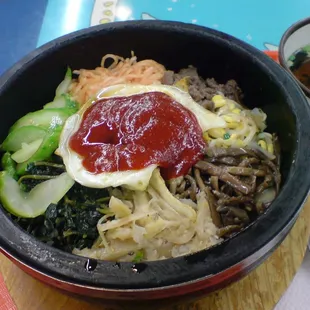 Bibimbop served in hot stoneware bowl