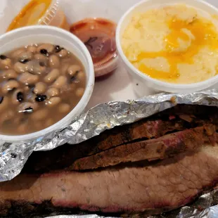 Beef Brisket Entree Platter with Black Eyed Peas and Cheese Grits