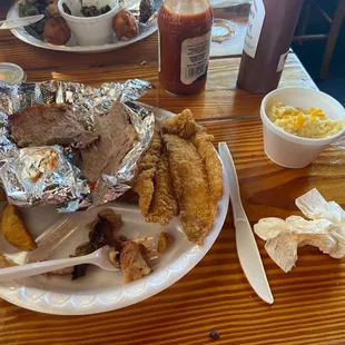 Brisket/catfish/cheese grits/fries - all disappointing... the brisket was anything but tender and catfish was blah.