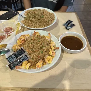 Large Fried Rice and Shrimp box with a side of the spicy sauce.