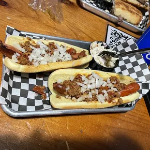 two hot dogs on buns