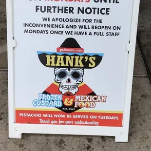Sign about closed on Mondays.